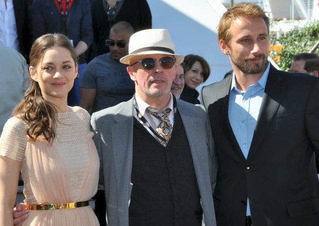 Marion Cotillard, Jacques Audiard, and Matthias Schoenaerts at the 2012 Cannes Film Festival.