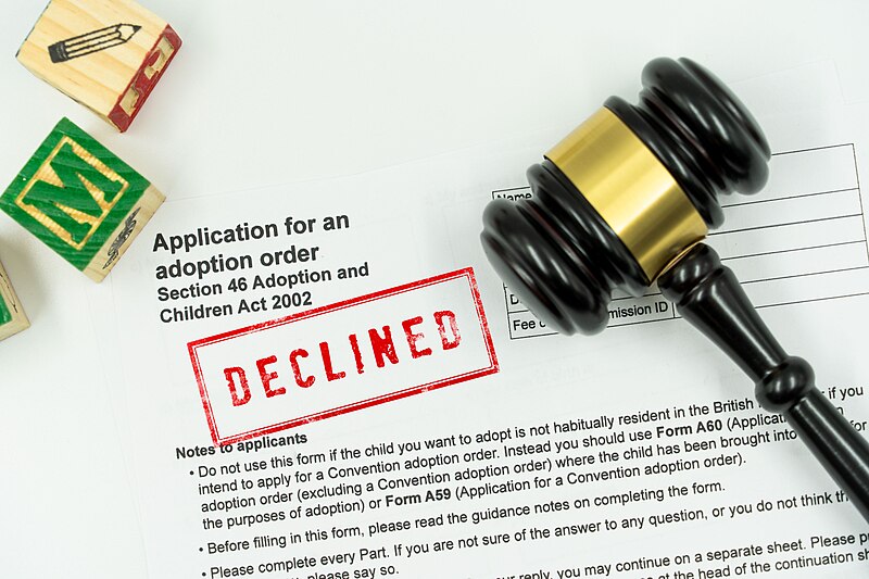 File:Declined adoption application forms with a gavel and some learning blocks placed on top. - 51070633691.jpg