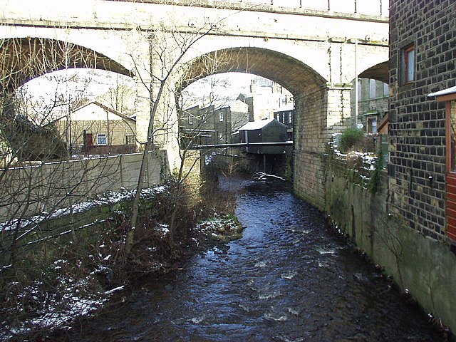 Elphin Brook passing under the Caldervale Line railway viaduct