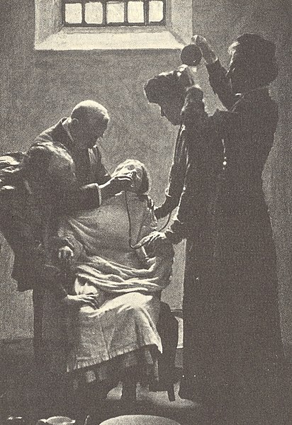 A suffragette is force-fed in HM Prison Holloway in the UK during hunger strikes for women's suffrage, approximately 1911.