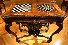 An early gaming table (Germany, 1735) featuring chess/draughts (left) and nine men's morris (right), Cleveland Museum of Art Gaming table with chessboard.jpg