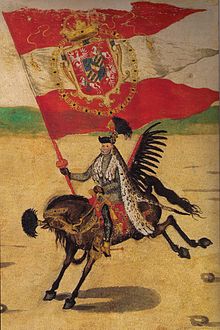 Stanislaw Sobieski, Grand Standard Bearer of the Polish Crown, carrying King Sigismund III's double-swallow-tailed royal banner consisting of red and white stripes emblazoned with a coat of arms combining the heraldic symbols of Poland, Lithuania, Sweden and the House of Vasa (c. 1605) Great Chorazy of the Polish Crown.jpg