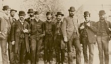 Harvey Washington Wiley, Chief Chemist of the Department of Agriculture's Division of Chemistry (third from the right) with his staff in 1883 Harvey Wiley, Chief Chemist of the Department of Agriculture's Division of Chemistry (cropped).jpg