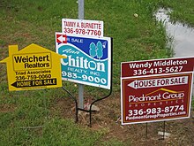 Lawn signs advertising houses for sale Houses for sale sign.jpg