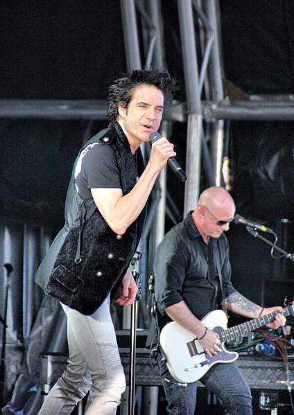 Monahan performing with Train in 2011
