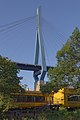 * Nomination Suspension Bridge over the Köhlbrand in the Port of Hamburg, eastern pylon --Dirtsc 11:34, 20 September 2019 (UTC) * Promotion Good quality. Somewhat soft to the top, probably due to perspective control, but thankfully no oversharpening. --Smial 12:03, 20 September 2019 (UTC)