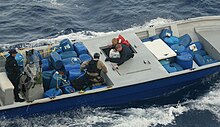 Members of LEDET 409 aboard a seized go-fast boat LEDET 409 drug interdiction.jpg