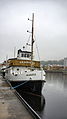 Slepebåten MS «Skarsfos» er solgt til private og ombygd til charterbåt. Foto: Roar Eriksen