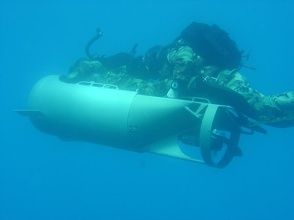 Two U.S. Marines of the Maritime Special Purpose Force operating a Diver Propulsion Device (DPD)