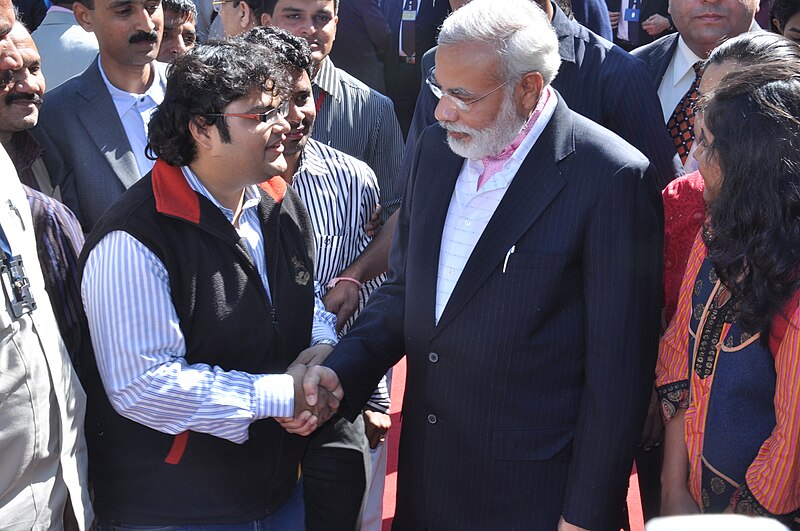 File:Narendra Modi shaking hands with a man.jpg