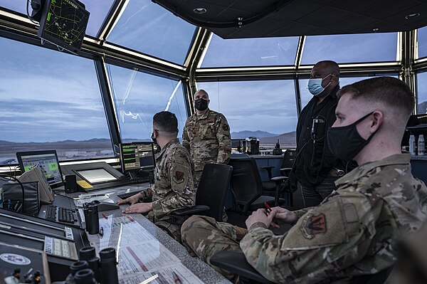 Air traffic controllers assigned to the group's 57th Operations Support Squadron monitor traffic at Nellis AFB during a Red Flag exercise in 2021