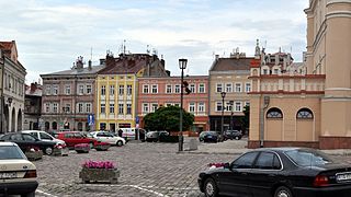 Markedspladsen Rynek med farverig historisk arkitektur