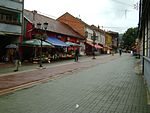 Pogled trga ali Čaršije - glavne ulice imenovane ulica Alije Izetbegovića v Gračanici.JPG