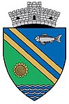 23 August község címere