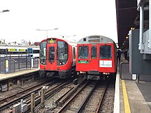 D78 Stock on its last day in service (right), next to its replacement, an S S7 Stock unit (left). S7 Stock 21347+48 and D78 Stock 7007+7032.jpg