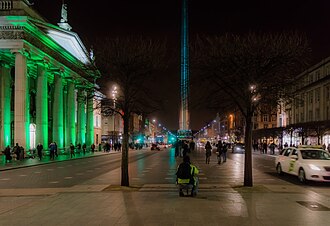 Dublin's General Post Office and the Spire on O'Connell Street on St. Patrick's Day ST. PATRICK'S SPIRE OF LIGHT ON O'CONNELL STREET IN DUBLIN REF-102056 (16650284488).jpg
