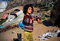 wmuk:File:Sabha,6, getting ready to walk to school from her house on the borders eastern Gaza strip, where she and her family are still living in tents.jpg