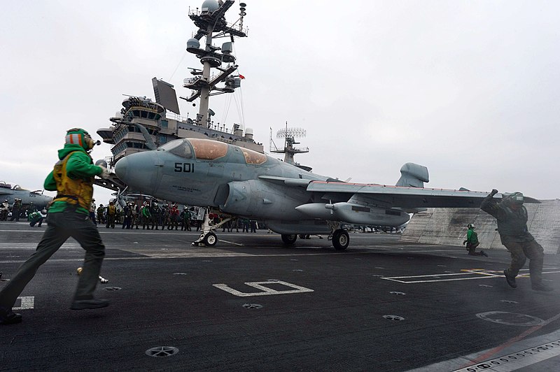 File:Sailors prepare to launch an aircraft at sea. (8693197018).jpg