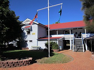 Block B with projecting teachers' room, 2015 Sectional School Building (Block B) with projecting teachers room; north elevation, view from parade ground, from northwest (EHP, 2 June 2015).jpg