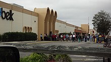 Elizabeth City Belk during renovation re-dedication in October 2013. The store's first extensive renovation since 1988 radically rearranged its interior configuration, but did not affect the exterior. Southgate Belk at renovation rededication ceremony 16Oct2013.JPG