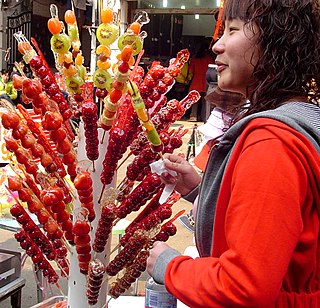 Tanghulu skewers of glazed fruit (mainly hawthorn) mainly sold on the streets of Beijing and Tianjin