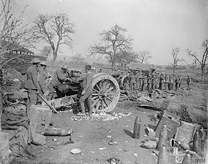 Crew checking the breech of a 6-inch howitzer during the Spring Offensive, 1918. The German Spring Offensive, March-july 1918 Q8606.jpg