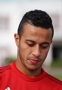 Thiago Alcantara, the son of Brazilian player Mazinho, was born in Italy but lived in Spain from a young age Thiago Training FC Bayern Munchen-7.jpg