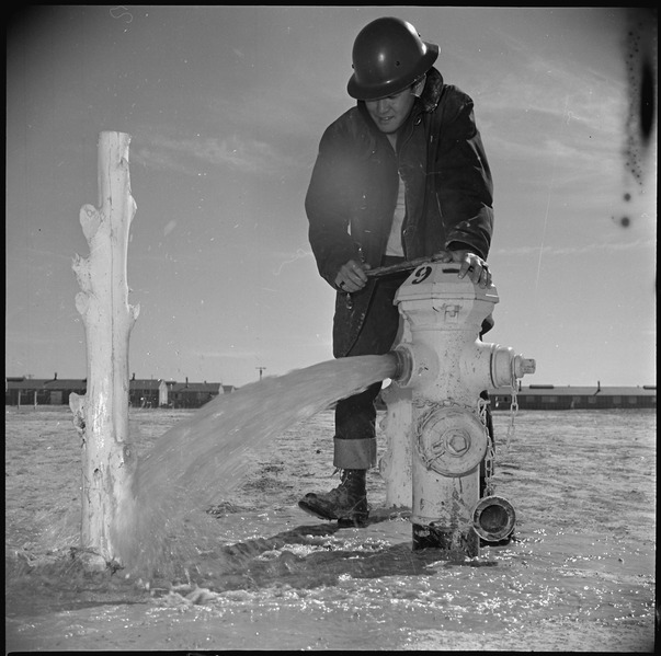 File:Topaz, Utah. Mike Yoshimine, an evacuee member of the Fire Derpartment, makes a routine check of a . . . - NARA - 536994.tif