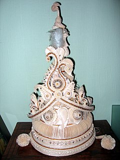 Topor (headgear) Conical headgear traditionally worn by grooms as part of the Bengali Hindu wedding ceremony