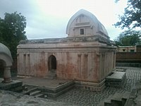 Trivikrama Temple with its chaitya arch.