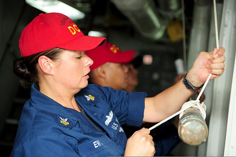 File:U.S. Navy Mass Communication Specialist 1st Class Heather Ewton, foreground, sets up a prop before a damage control drill May 30, 2013, aboard the U.S. 7th Fleet command ship USS Blue Ridge (LCC 19) in the South 130530-N-QI421-547.jpg