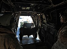 M327 towed 120mm heavy mortar and M1163 Growler back into an MV-22 Osprey on board USS Iwo Jima. USMC-111026-M-KU932-203.jpg