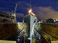 Cassin Young in dry dock at night