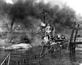 Wreckage of bombed YFD-2 and Shaw at Pearl Harbor