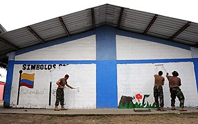 US Navy 110605-F-ET173-025 ailors embarked aboard the Military Sealift Command hospital ship USNS Comfort (T-AH 20) paint the walls of Institucion.jpg