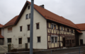 English: Half-timbered building in Helpershain, Muehlweg 6, Ulrichstein, Hesse, Germany This is a picture of the Hessian Kulturdenkmal (cultural monument) with the ID Unknown? (Wikidata)