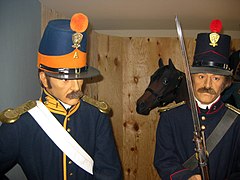 One of the several uniform displays in the barracks.