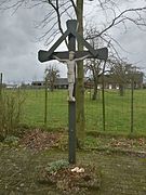 Veldkruis aan de Americaansweg-Venweg in Kronenberg. Het corpus werd vervaardigd door Piet Killaars.