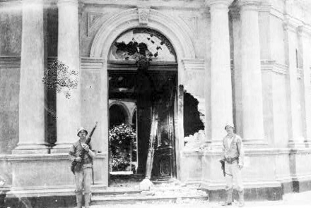 Damaged entrance to a high school adjacent to the Veracruz Naval Academy