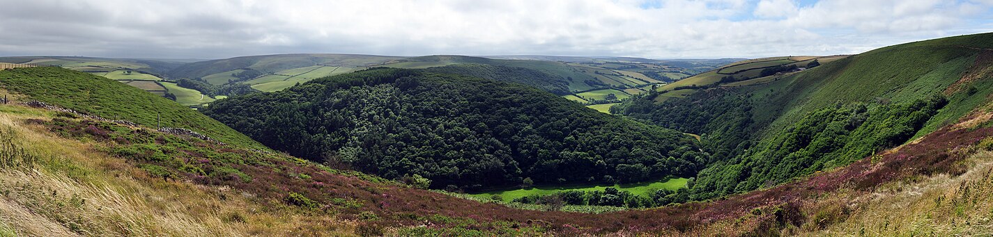 East Lyn Valley. To the east (left) is Somerset, to the west (right) Devon View from County Gate, Exmoor.jpg