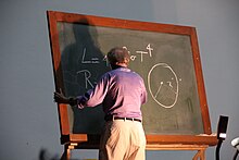 Lewin with a blackboard Walter Lewin Techkriti.JPG