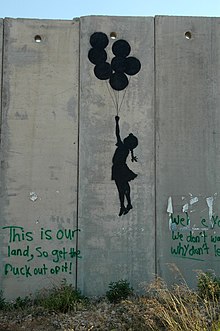 Banksy's Flying Balloon Girl near the Qalandia checkpoint. West Bank wall at Kalandia (174617912).jpg