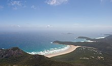 Tidal River as viewed from the summit of Mount Oberon. The settlement of Tidal River is visible in the bottom-right corner. Wilson's Promontory - Tidal River from Mt Oberon - Dec 2004.jpg