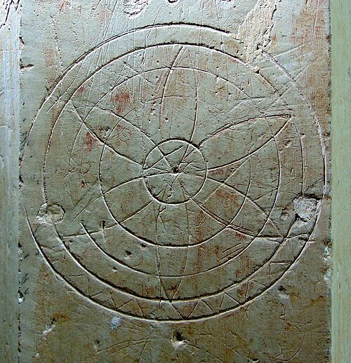 Medieval apotropaic marking on the inside of a church in Suffolk, England.