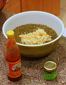 Gumbo z'herbes, served with filé powder and hot sauce