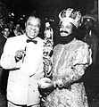 Louis Armstrong with the King of the Zulu, Mardi Gras 1955