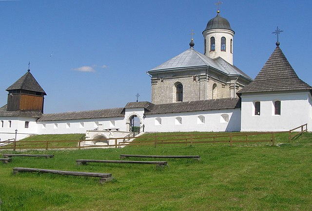 Dormition Cathedral with the restored medieval city walls
