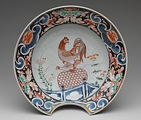 The European shape of a barber's shaving basin bowl, with copulating cock, around 1700