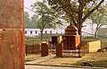 A woman worshiping at a Hindu temple nearby Platform No. 2