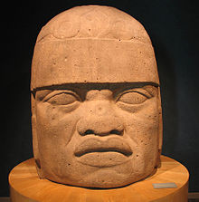 San Lorenzo Tenochtitlan Colossal Head 6, a 3-meter-high Olmec sculpture with lips and nose said to resemble African facial features. 20041229-Olmec Head (Museo Nacional de Antropologia).jpg